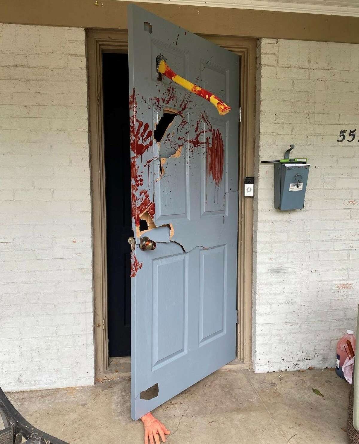 Steven Novak said he bought another door to give the illusion of a broken and open door as part of his Halloween display.