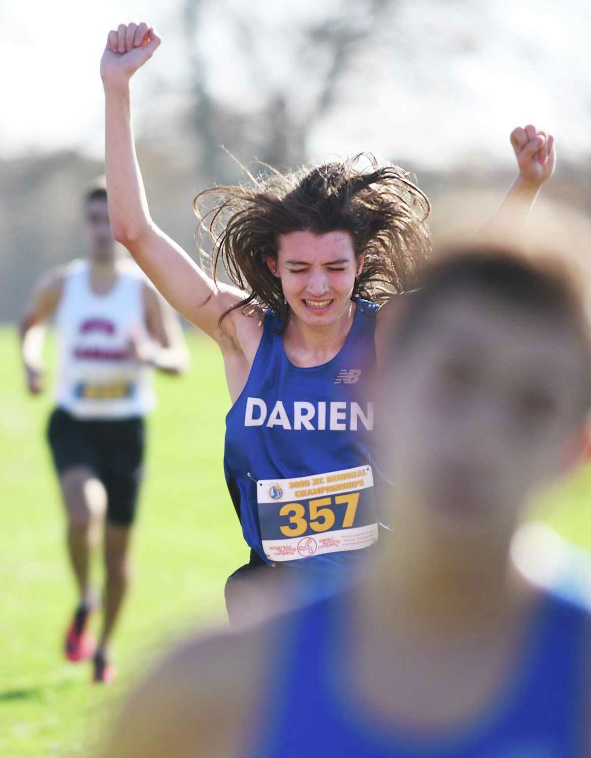 Darien's Evan O'Rourke crosses the finish line with a time of 17:08 to take fourth place in the West Region heat of the FCIAC boys cross country championship at Waveny Park in New Canaan, Conn. Wednesday, Nov. 4, 2020.