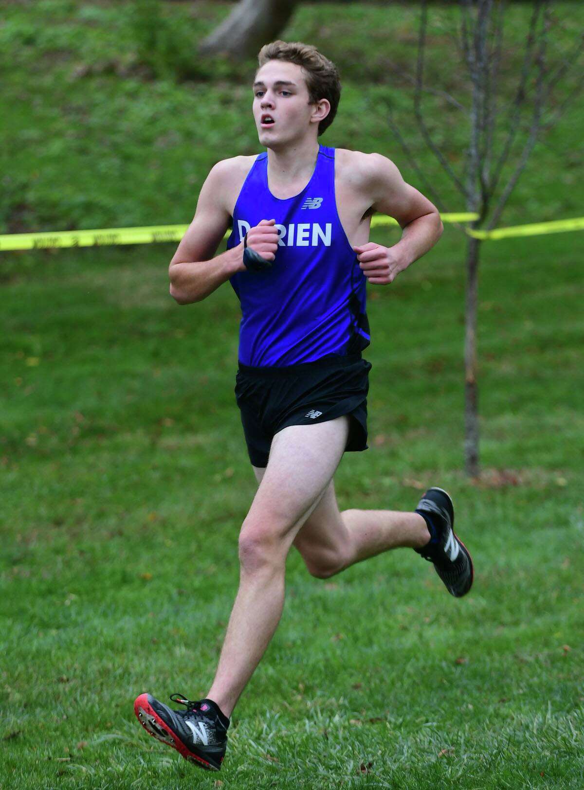 Luke Riordan and the Darien High School boys cross country team takes on Greenwich Tuesday, October 27, 2020, at Tod's Point in Greenwich, Conn.