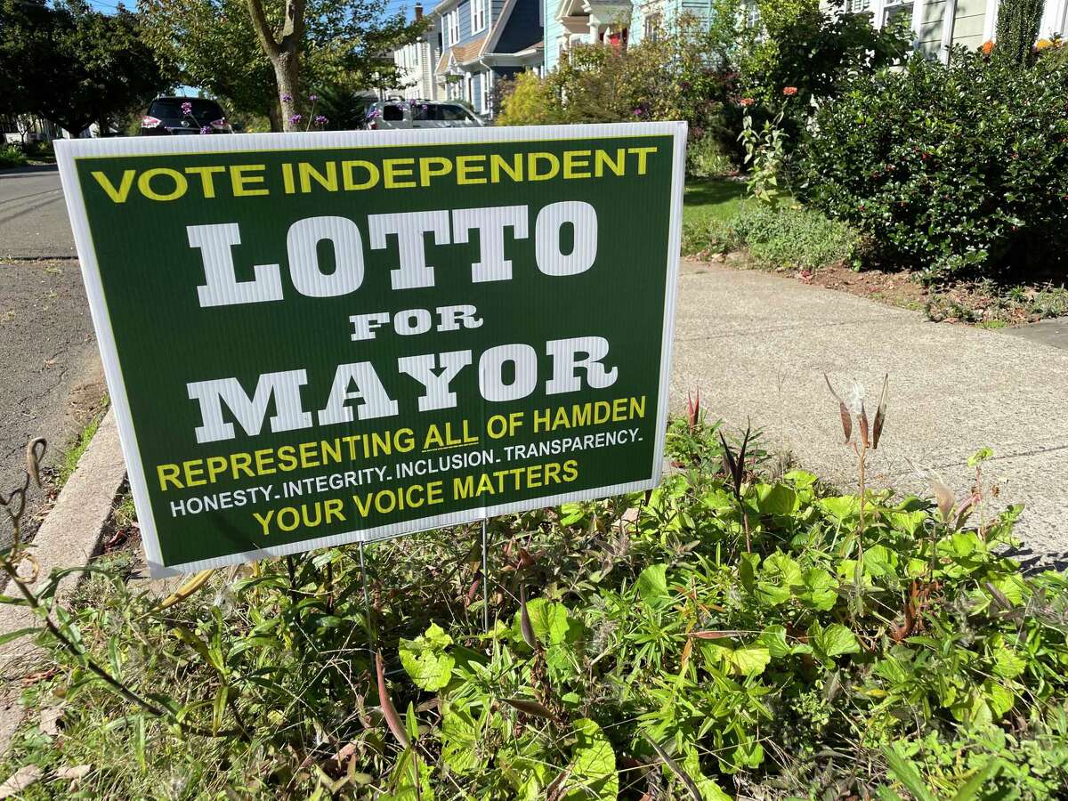 A sign showing support of write-in candidate Albert Lotto, who is running for mayor, on Harmon Street in Hamden Oct. 19, 2021.