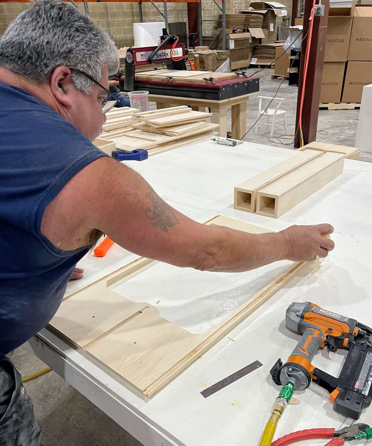 Wood crafter from Milton & Goose, toy manufacturer that relocated its operations from Lancaster, Pennsylvania to Monroe, Connecticut.