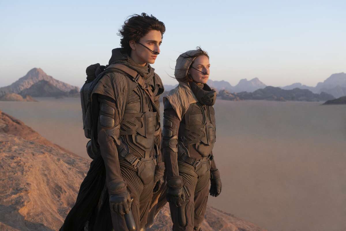 Timothée Chalamet (left) as Paul Atreides and Rebecca Ferguson as Lady Jessica Atreides in "Dune."