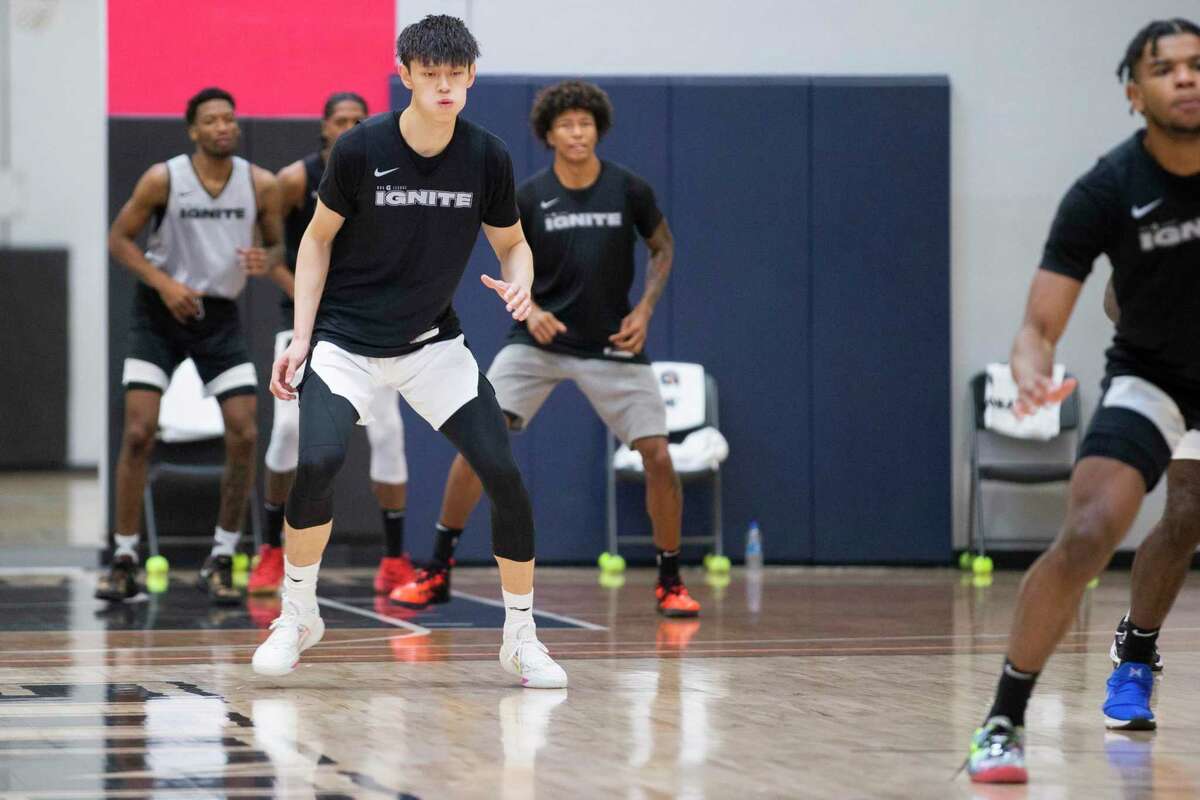 Fanbo Zeng practices at the Ultimate Fieldhouse, Tuesday, Oct. 19, 2021, in Walnut Creek, Calif. Zeng, 18, plays as a forward for the NBA G League Ignite.