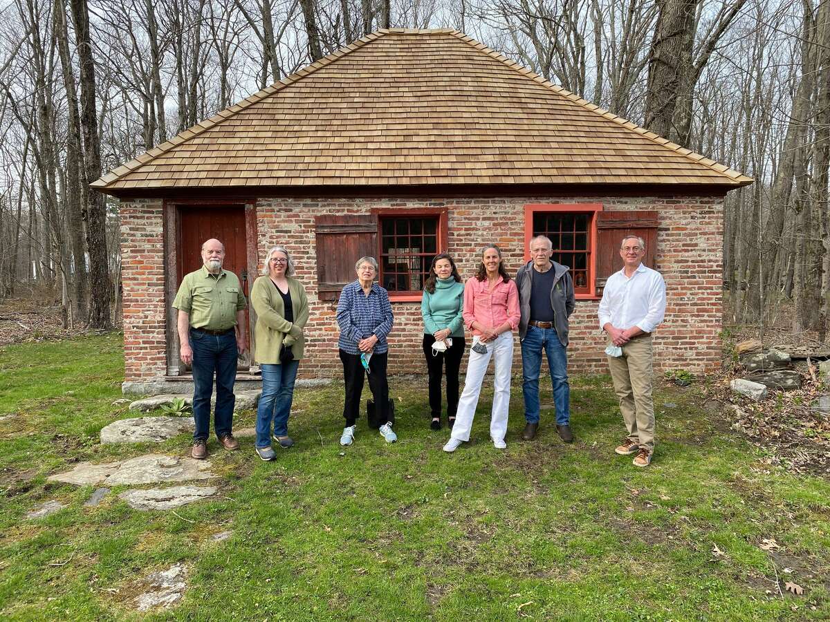 The Brick School in Warren. The Board of the Warren Connecticut Historical Society. From left, Craig Nelson, Heather Blue Forstmann, Marylyn Hendricks, Harriet Shapiro, Joanne Mansfield, Jon Garvey and John Favreau.