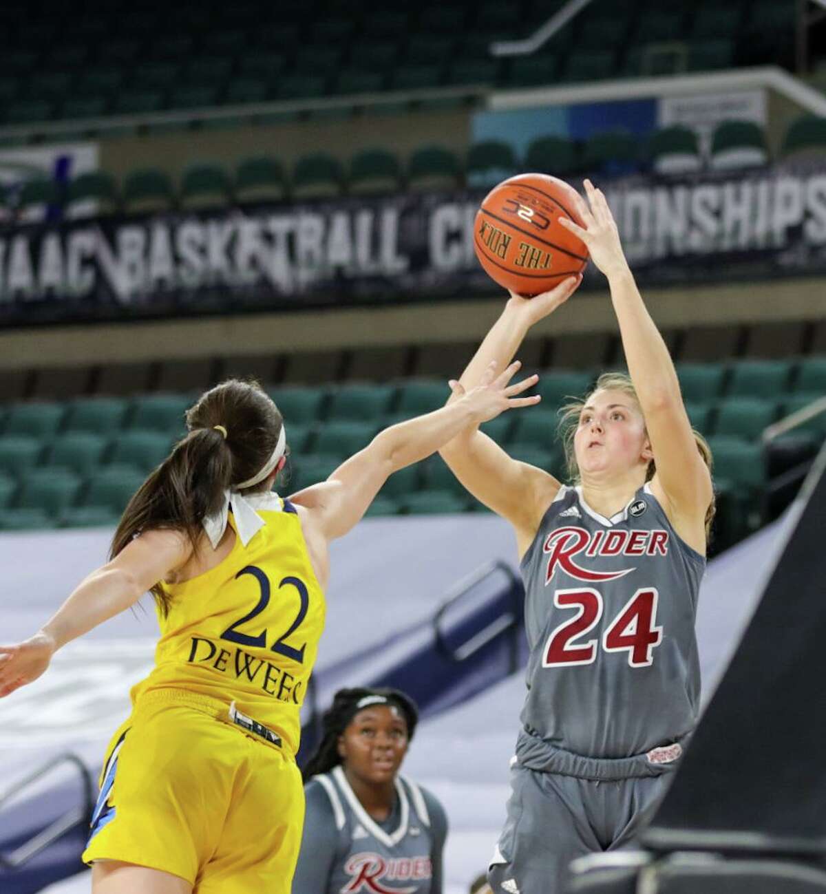 Quinnipiac junior guard Mackenzie DeWees reaches for the ball. The Bobcats were upset by No. 7 seed Rider, 62-50, in the quarterfinals of the 2021 MAAC Tournament. Photo courtesy of MAAC Tournament.