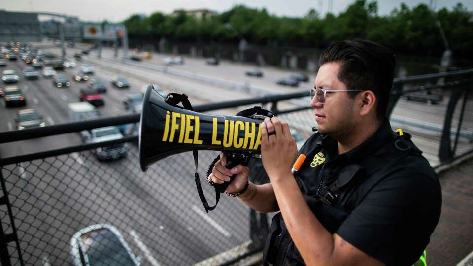 Cesar Espinosa, executive director at FIEL Houston Inc. at Dunlavy St. bridge, a place where the organization often organizes demonstrations, Thursday, Aug. 26, 2021, in Houston.