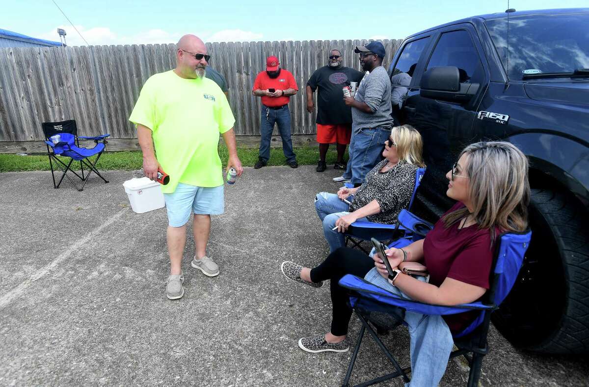 Locked out USW workers who voted in the morning shift wait outside the IBEW union hall in Beaumont to await the results on the proposal set forth by ExxonMobil. Photo made Tuesday, October 19, 2021 Kim Brent/The Enterprise