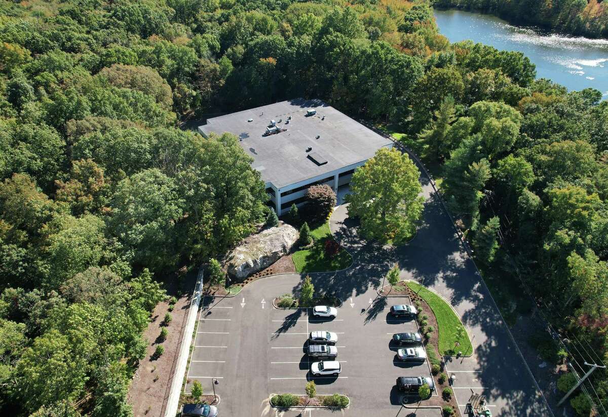 The office building at 3 Parklands Drive in Darien, Conn., photographed on Tuesday, Oct. 19, 2021. A plan has been proposed to raze the existing office building and redevelop the property as a multifamily residential.