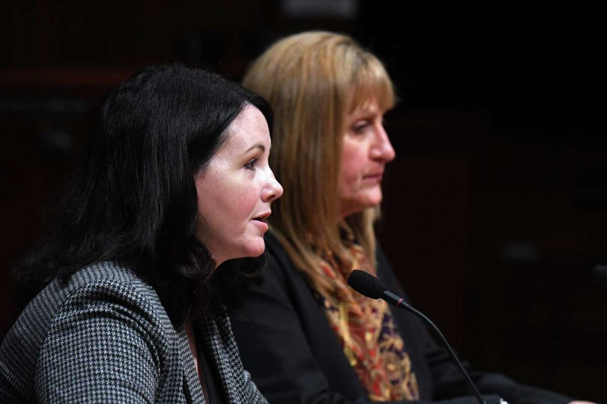 Sarah Ravenhall, executive director of the NYS Association of County Health Officials, left, and Suzanne Lavigne, director of Community Services for Franklin County, right, offer testimony before a state Senate joint task force on opioids, addiction and overdose panel during a public hearing held to review the impacts the COVID-19 pandemic has had on the overdose crisis on Wednesday, Oct. 20, 2021, at the Legislative Office Building in Albany, N.Y.