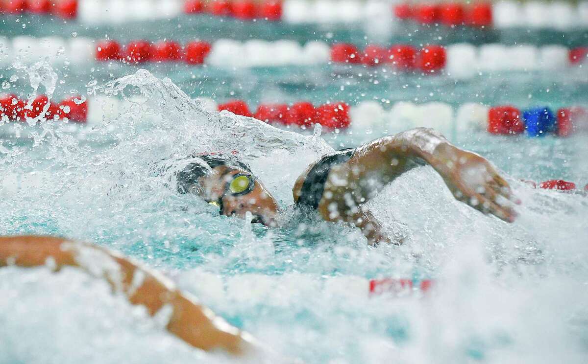 New Canaan Skylar Mascarinas completes in the 50 Freestyle in an FCIAC Dual Swim and Dive Meet against Greenwich at Greenwich High School on Oct. 4, 2019.