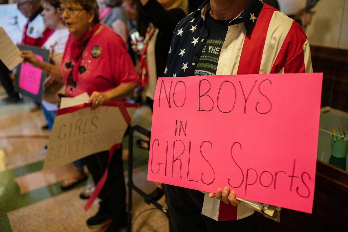Demonstrators supporting restrictions on transgender student athletes are gathered at the Texas State Capitol on the first day of the 87th Legislature's third special session on September 20, 2021 in Austin, Texas.