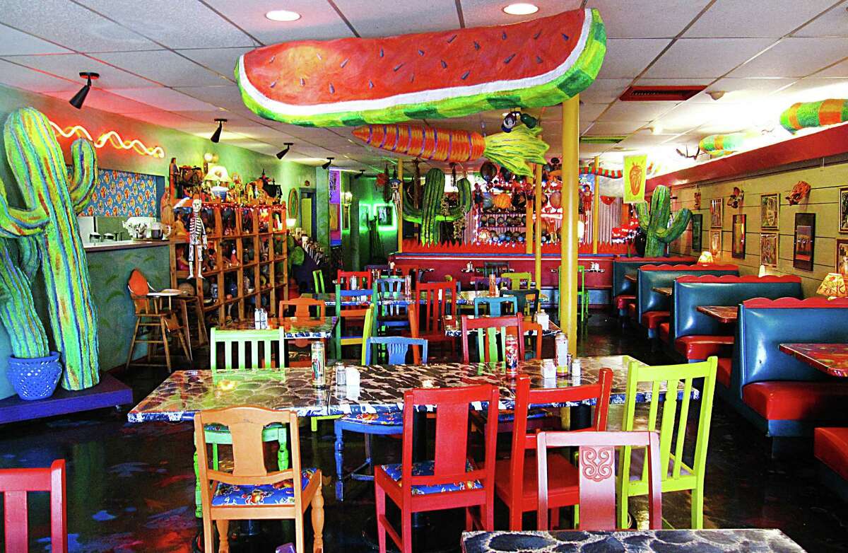 Colorful folk art by co-owner Dan Soder decorates Adelante Restaurant, a health-conscious Mexican restaurant near Alamo Heights that’s been in business or four decades. It’s closing April 1 of next year.