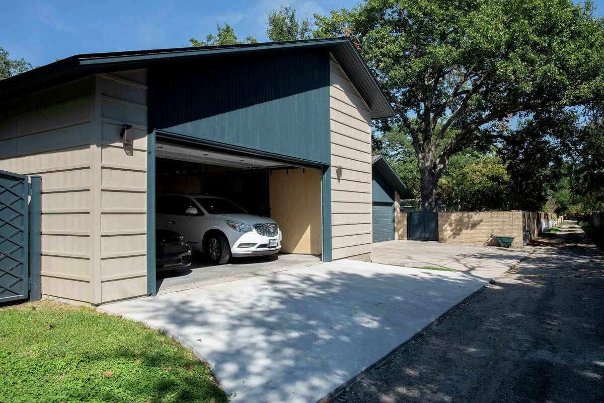 The newly built garage was built to match the style and color of the house and original garage, which it sits next to.