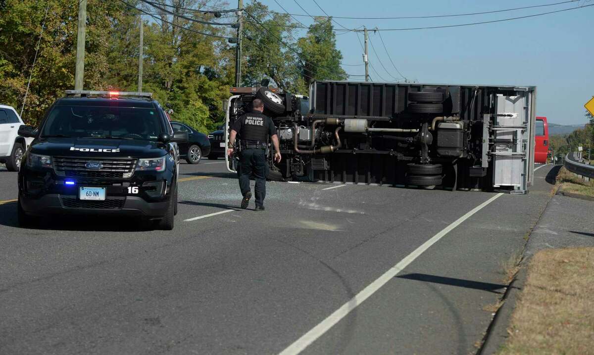 An overturned box truck was involved in a multi-vehicle accident on Danbury Road, Route 7, in New Milford, Conn, Wednesday morning, October 20, 2021.