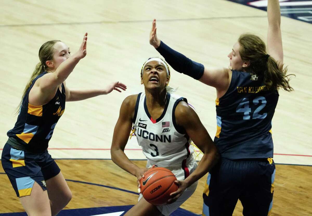 Mar 1, 2021; Storrs, Connecticut, USA; UConn Huskies forward Aaliyah Edwards (3) controls the ball against the Marquette Golden Eagles in the second half at Harry A. Gampel Pavilion. UConn won 63-53. Mandatory Credit: David Butler II-USA TODAY Sports