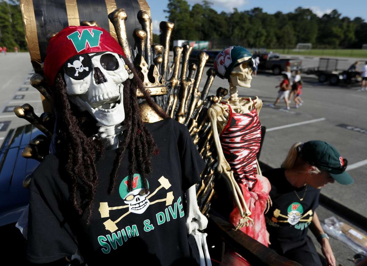 Skeletons for The Woodlands High School swim team's float are seen before the school's homecoming parade and pep rally, Wednesday, Oct. 20, 2021, in The Woodlands. The school's football team hosts Grand Oaks on Friday for their homecoming game.