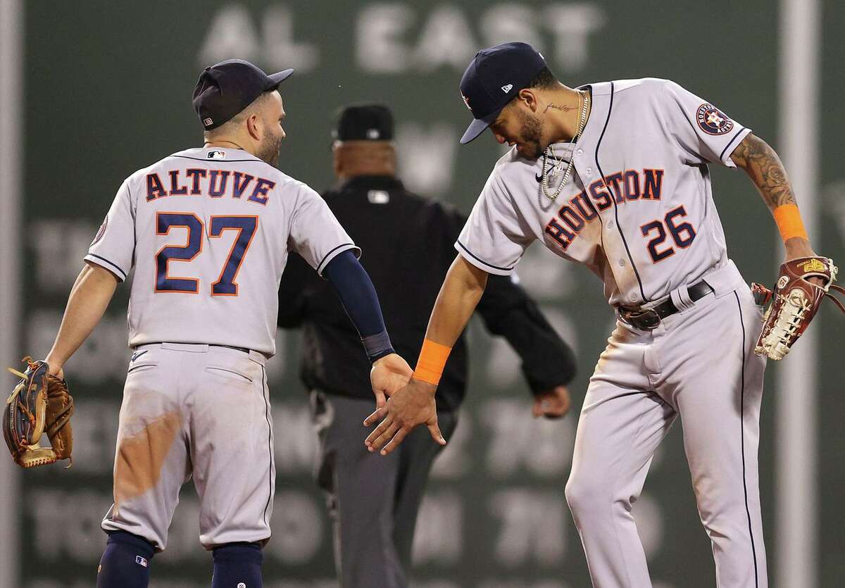 Altuve hits 3 home runs as Astros rout Red Sox