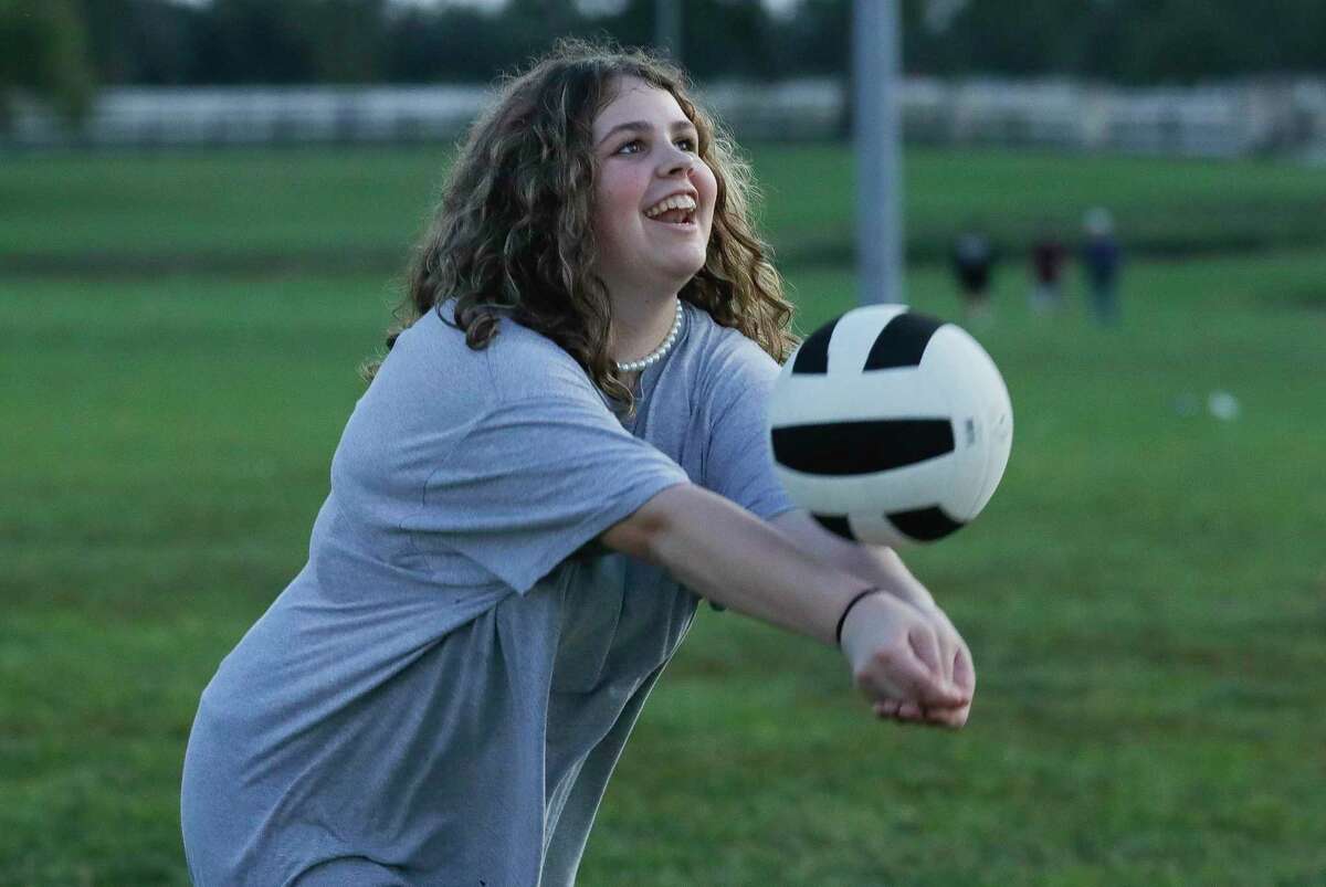 Audrey Caro plays volleyball as the Montgomery High School community came together for the school’s annual bonfire at Fellowship of Montgomery, Wednesday, Oct. 20, 2021, in Montgomery. The Bears will host Lamar Consolidated on Friday for their homecoming game.