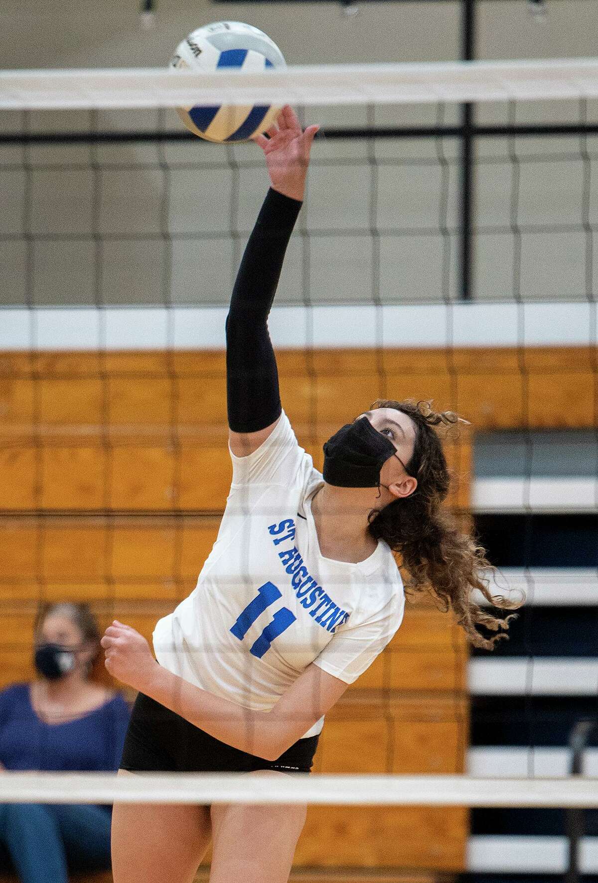 St. Augustine High School Kelly Samano goes for the kill Saturday, Aug. 14, 2021, in a game against San Isidro Valley High School at St. Augustine High School during the during the Marissa Keene M.D. Memorial Volleyball Tournament.