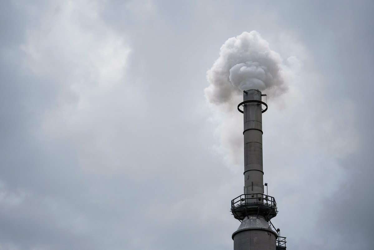 Smoke from a power plant in San Antonio on Aug. 4, 2021. The power grid's failure during a February winter storm spurred state lawmakers to formalize the Texas Energy Reliability Council, a 25-member body tasked with fostering communication and planning to improve how the grid functions.