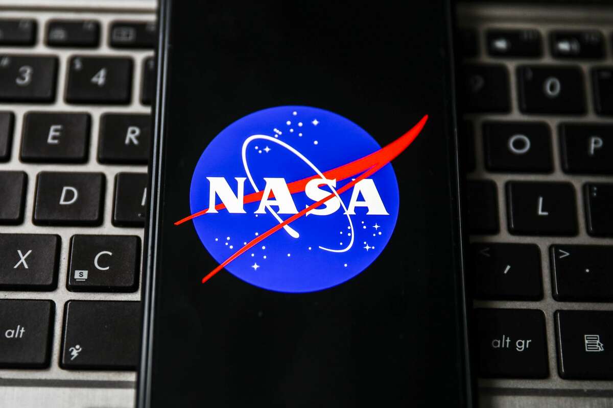 NASA logo is displayed on a mobile phone screen photographed for illustration photo. (Photo by Beata Zawrzel/NurPhoto via Getty Images)