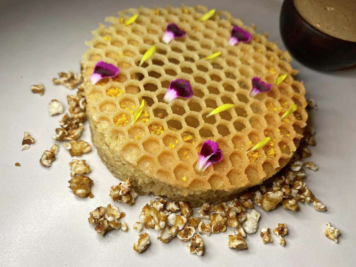 Dessert from the Chiapas menu is cake soaked in honey water with a vanilla honeycomb tuile, cinnamon dulce de leche and cafe de olla ice cream at Mixtli. Mixtli’s Sofia Tejeda is a semifinalist for Outstanding Pastry Chef in the James Beard Foundation’s 2022 Restaurant and Chef Awards.
