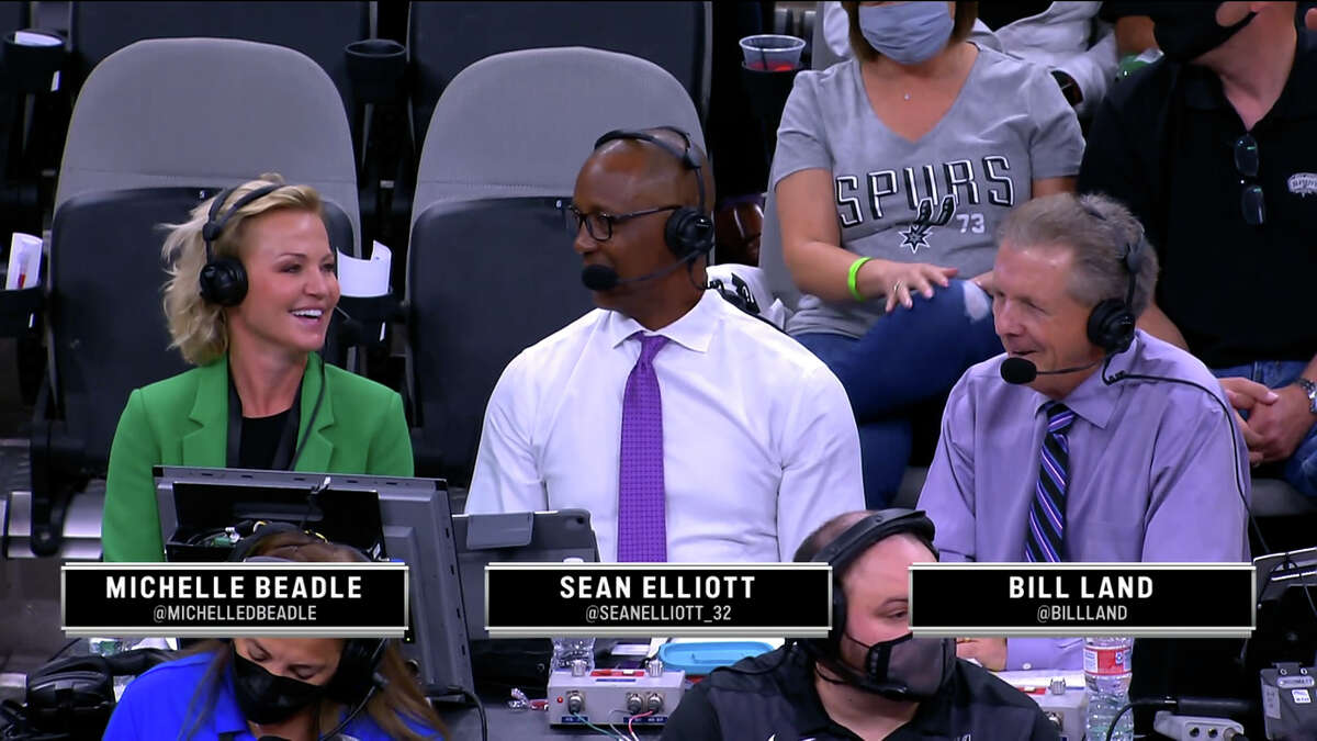 Former ESPN host Michelle Beadle is pictured next to San Antonio Spurs' broadcasters Sean Elliot and Bill Land during Wednesday night's game.