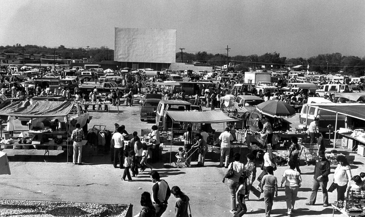 Mission Drive-In turned into a flea market in this Dec. 1984 photo. Now known as Mission Marquee Plaza, the site hosts farmers markets and other events, in addition to movie screenings.