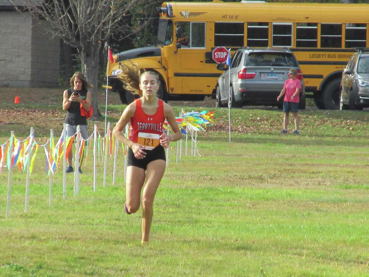 Individual girls champion Katie DeForest glides down the final stretch at the Berkshire League Cross Country Championships Thursday afternoon at Thomaston’s Black Rock State Park.