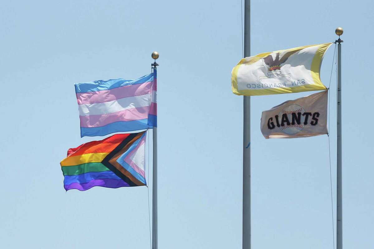 A rainbow colored logo is shown on the jersey of San Francisco Giants'  Brandon Crawford for the team's Pride Day during a baseball game against  the Chicago Cubs in San Francisco, Saturday