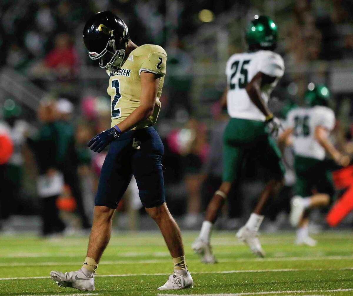 Lake Creek wide receiver Sam Lee (2) walks off the field after an a pass intended for him was intercepted by Huntsville during the third quarter of a District 10-5A (Div. II) high school football game at MISD Stadium, Thursday, Oct. 21, 2021, in Montgomery.