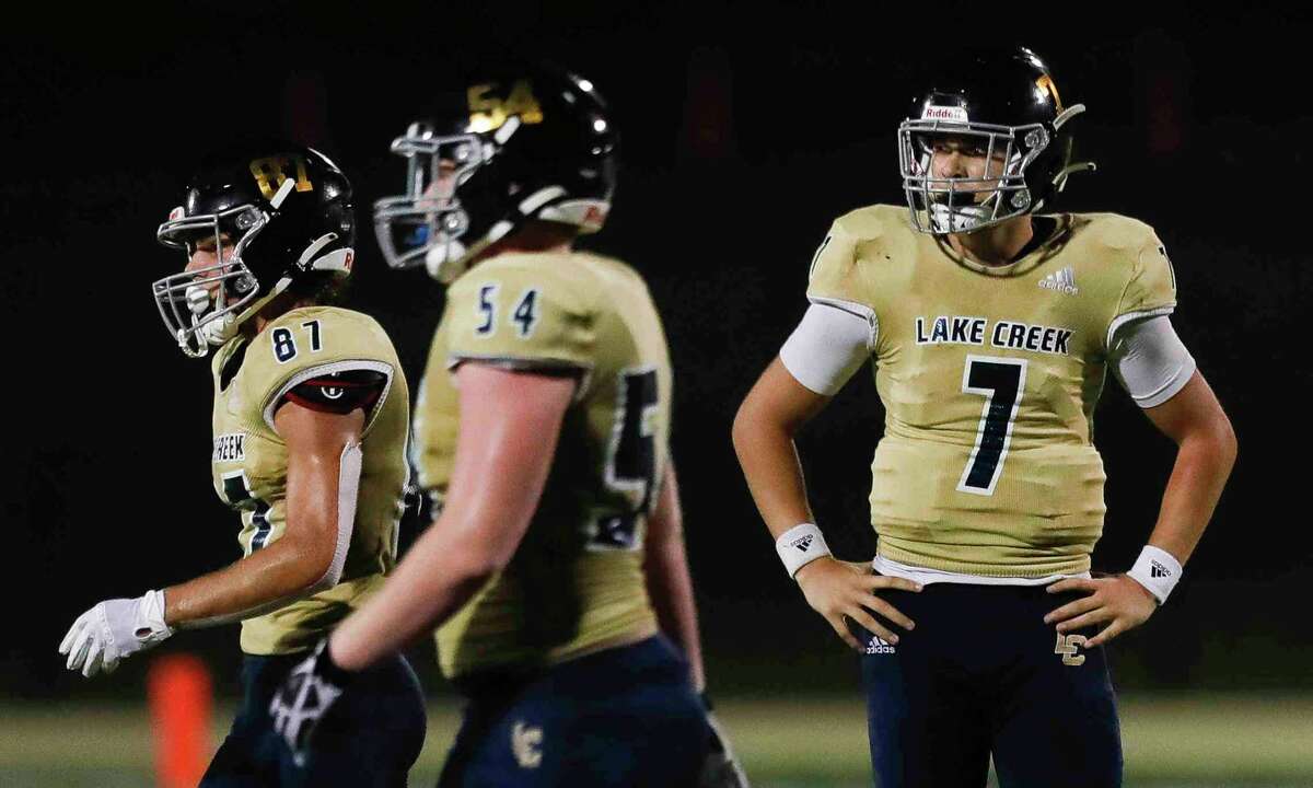 Lake Creek quarterback Cade Tessier (7) reacts after coming up short of fourth down during the third quarter of a District 10-5A (Div. II) high school football game at MISD Stadium, Thursday, Oct. 21, 2021, in Montgomery.