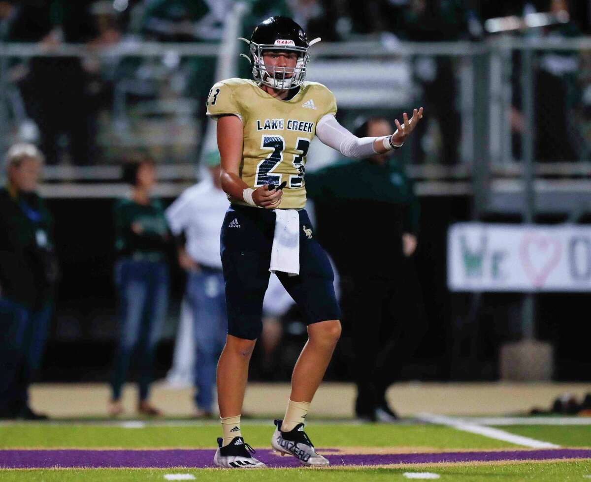 Lake Creek quarterback Parker Smith (23) reacts after a missed throw on third down during the third quarter of a District 10-5A (Div. II) high school football game at MISD Stadium, Thursday, Oct. 21, 2021, in Montgomery.