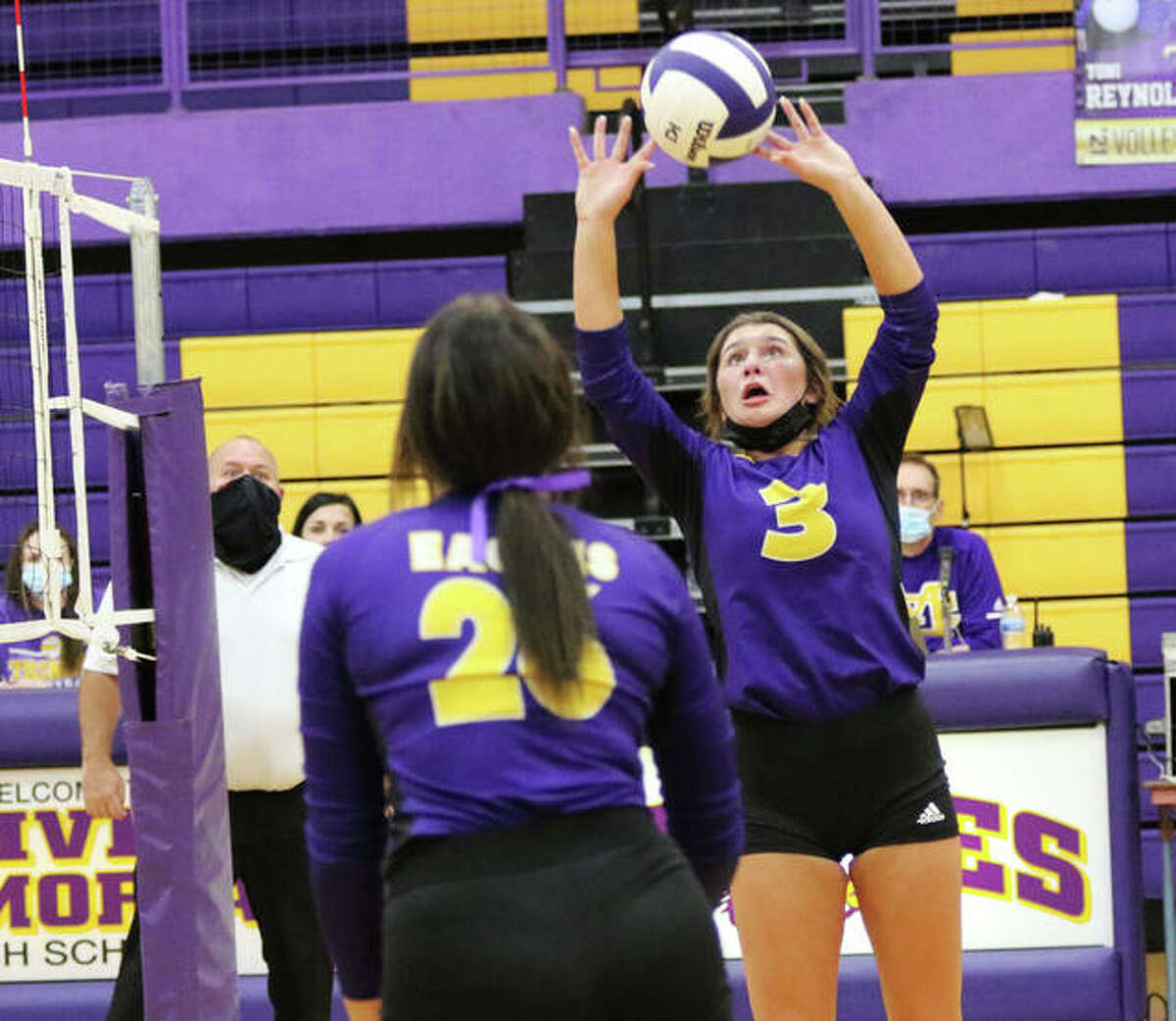 CM’s Maddie Brueckner (3) sets while teammate Camryn Gehrs goes to the net during Tuesday’s MVC match vs. Mascoutah in Bethalto. On Thursday in Jerseyville, Brueckner had a career-high 38 assists in the Eagles’ win over Jersey.