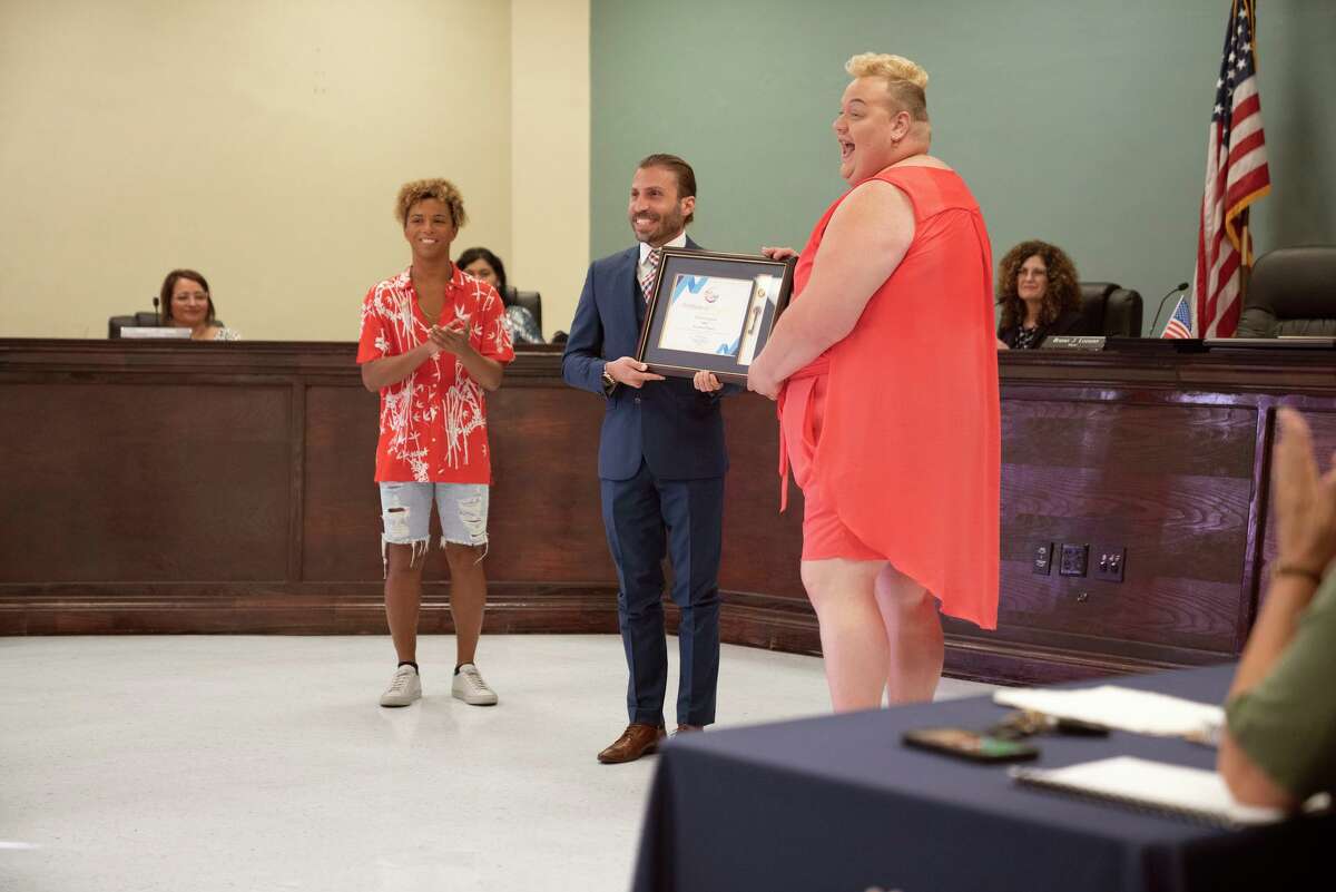 Mayor Bruno Lozano presents a key to the city to the cast of “We’re Here” during a Del Rio City Council meeting on Monday’s episode of the HBO reality show.