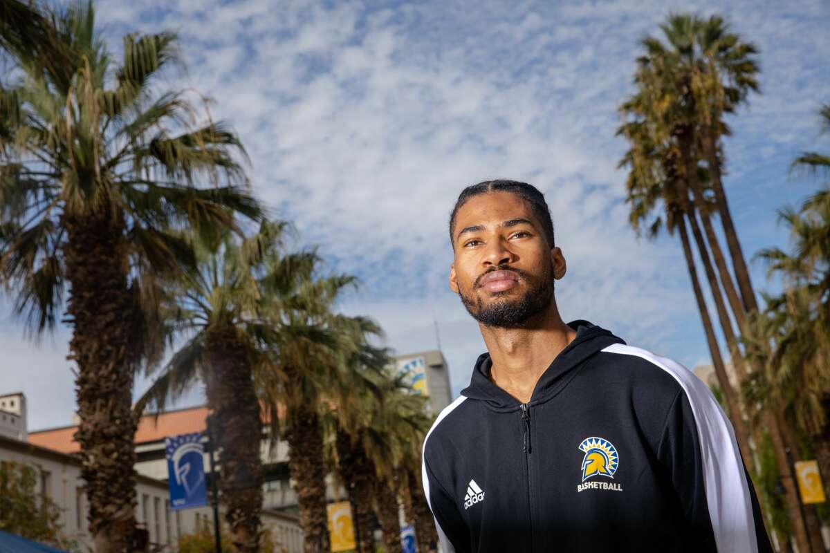 San Jose State University basketball player Richard Washington poses for a photograph on the SJSU campus in San Jose, Calif., on Oct. 21, 2021. Washington is appealing a season-long suspension by the NCAA for hiring a non-compliant NCAA agent and playing in a three-on-three tournament where he made roughly $2,700. 