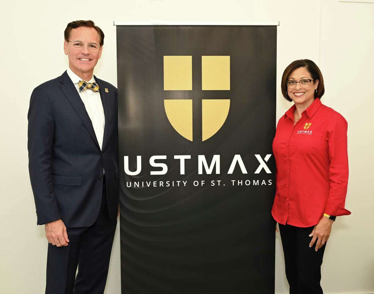 University of St. Thomas celebrated the one year anniversary of its Conroe satellite campus on Wednesday. University President Richard Ludwick stands with Carla Alsandor, the director of the USTMAX Center in Conroe.