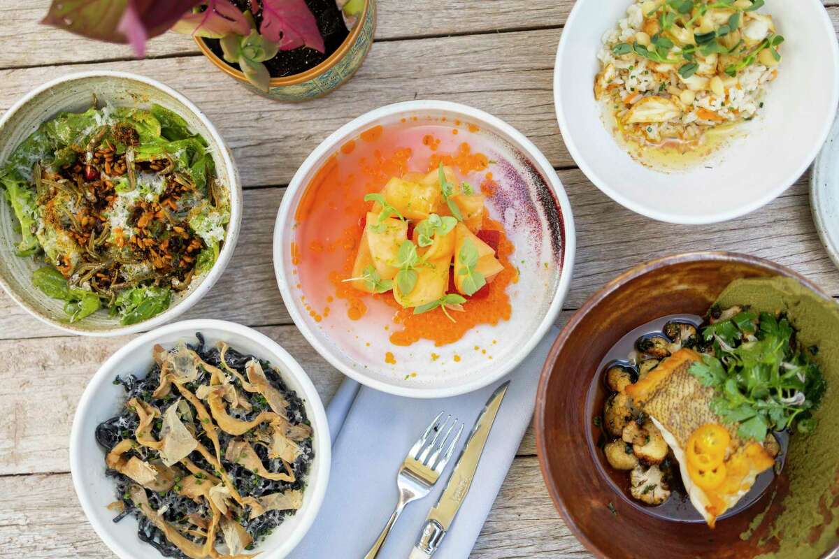As assortment of dishes at Roots Wine Bar, one of Alison Cook’s 20 Most Interesting Restaurants.