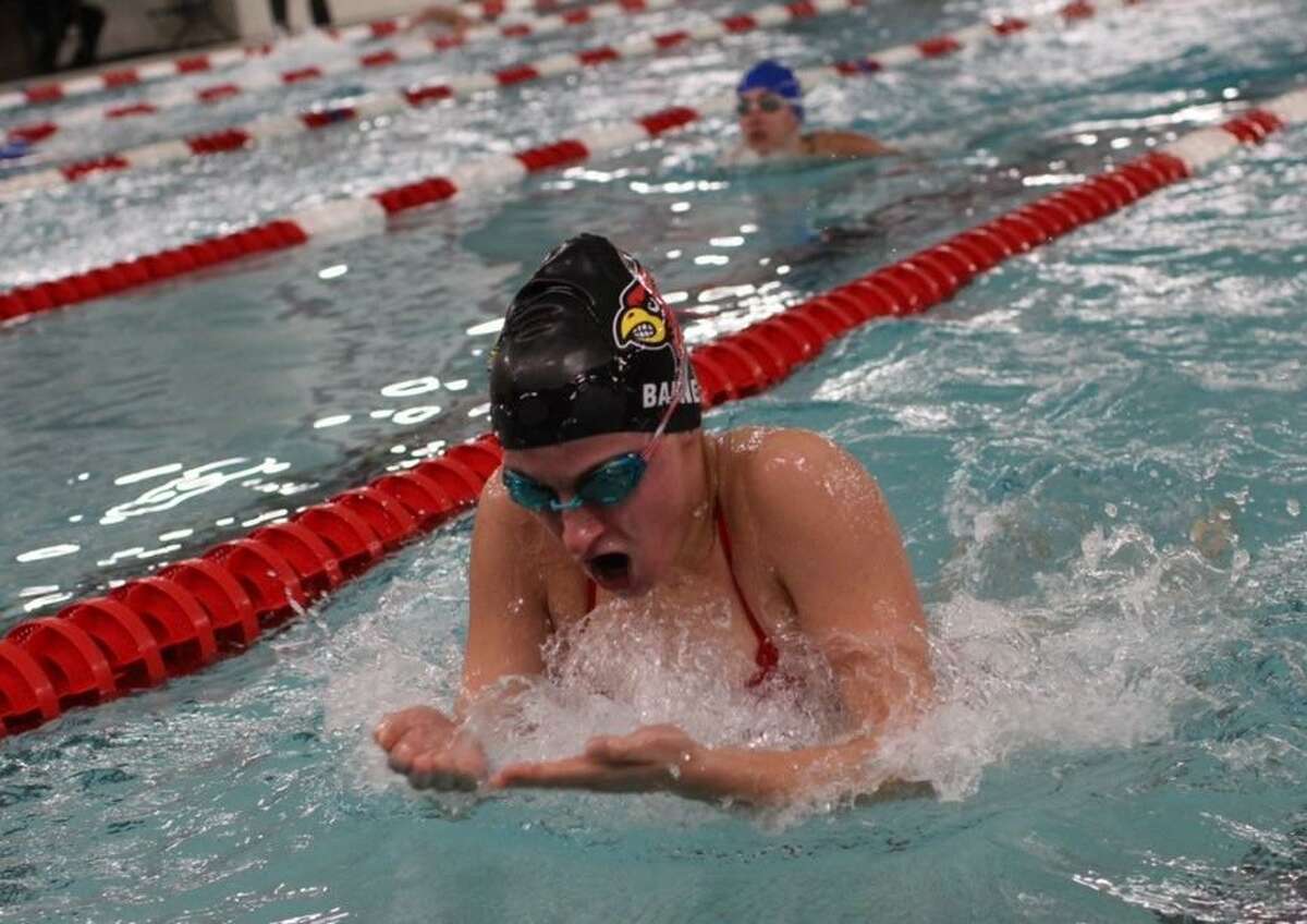 Senior Olivia Baine competes in the 200 intermediate relay and the 100 breaststroke for Greenwich.