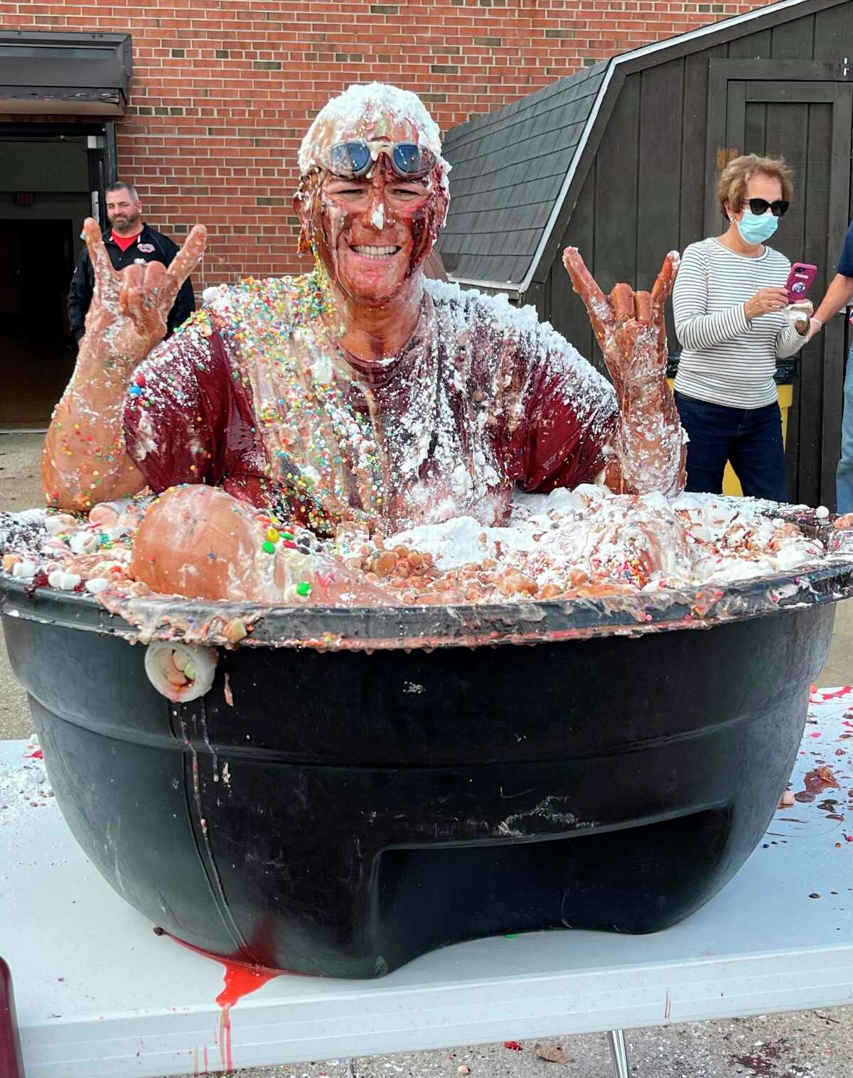 Riverview Elementary students took turns pouring a variety of toppings onto Principal Renee Kent. The sticky situation was in conjunction with the school reaching its goal for this year's Move-a-Thon. (Photo courtesy of Kim Horvath)