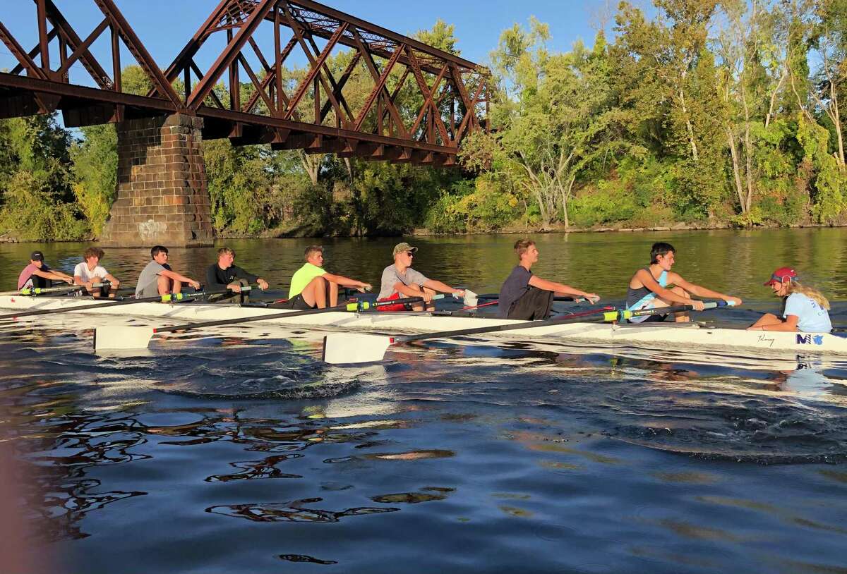 With direction from coxswain Nayda Farnsworth, the Middletown boys varsity 8 takes a practice run on the Connecticut River on Wednesday, Oct. 20, 2021. Front to back: Drew Ngo, Andrew Green, Danny Smith, Eric Liesener, Paolo Nassetta, Jake Guarino, Michael Czyz and Danny Carlson.