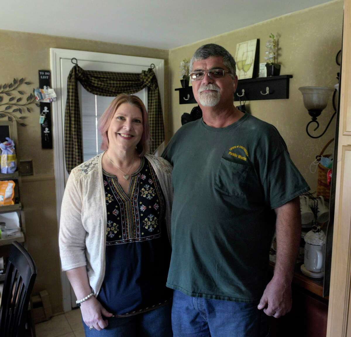 Gerard Magel, with his wife Shelly, is hearing impaired since birth and has sued the town of Southbury, his former foreman, and the former director, of the Southbury Public Works Department, over an alleged American with Disabilities Act compliance issue. Thursday, October 21, 2021, Oakville, Conn.