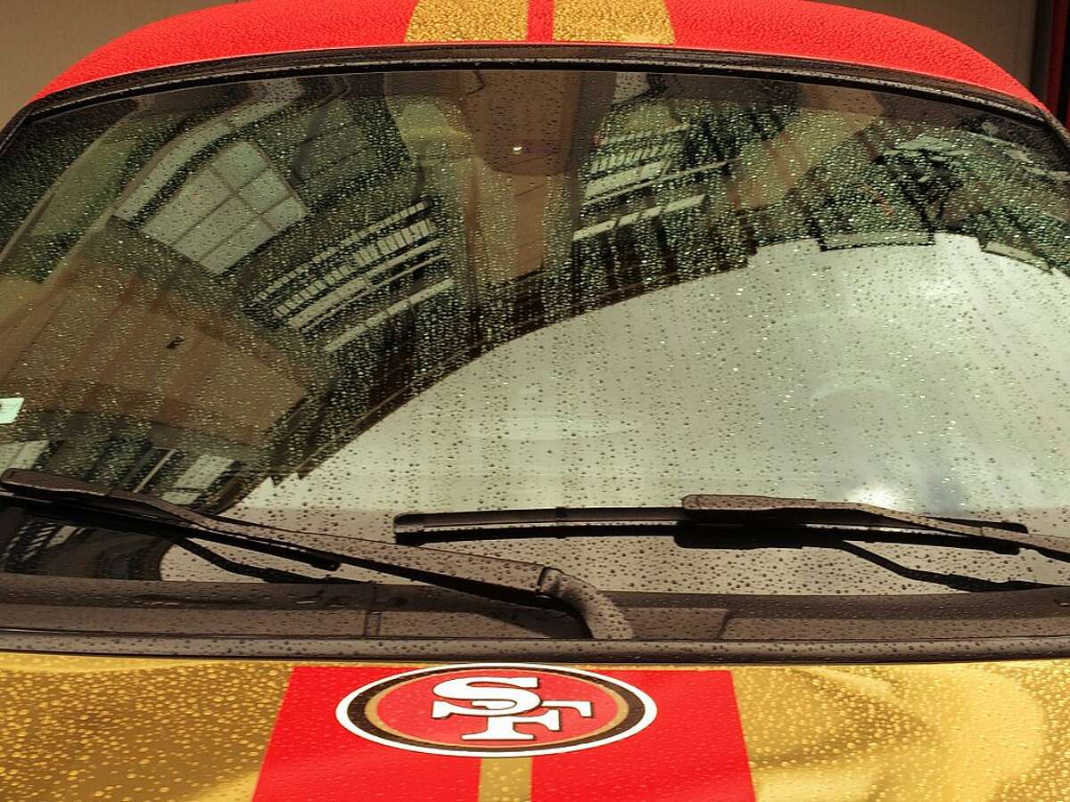 A San Francisco 49ers sports fan's custom wrapped Mini Cooper in Santa Clara.