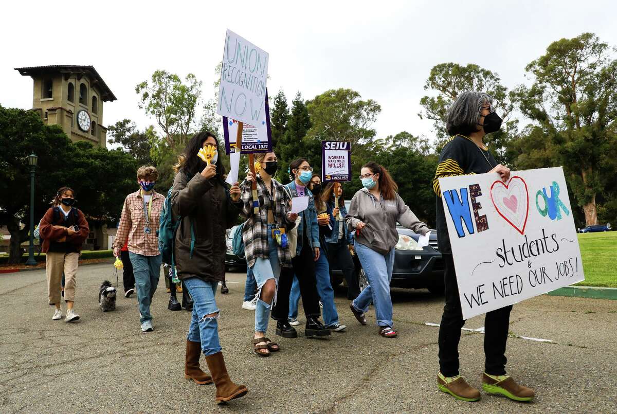 Staff, adjunct faculty, students, and union members rally this month at Mills College in Oakland for a fair union contract with job protections after the Northeastern University takeover. The historic women’s school is set to merge with the private Boston university next year.