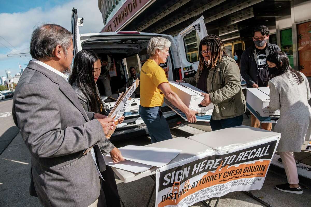 Organizers with the recall campaign against District Attorney Chesa Boudin make final preparations before submitting tens of thousands more signatures than required to qualify for the ballot in San Francisco on Friday,October 22, 2021.