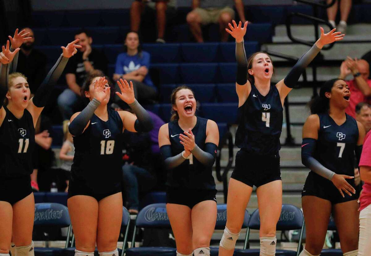College Park’s Ruth Hedderman (4) reacts after a block by Don 'Yah Cosie during the first set of a high school volleyball match at College Park High School, Friday, Oct. 22, 2021, in The Woodlands.