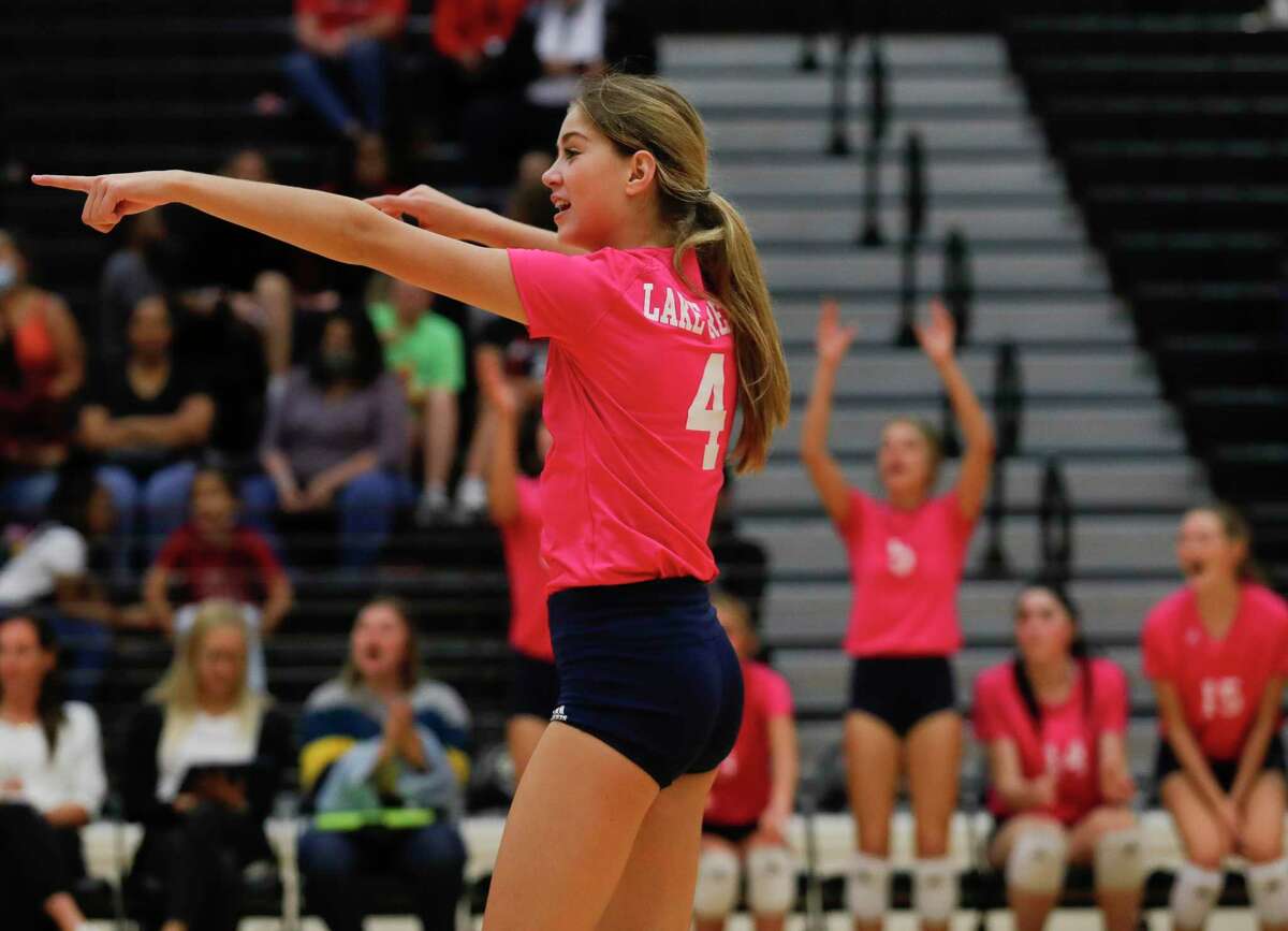 Lake Creek’s Payton Woods (4) reacts after a point in the first set of a high school volleyball match at Porter High School, Tuesday, Oct. 19, 2021, in Porter.