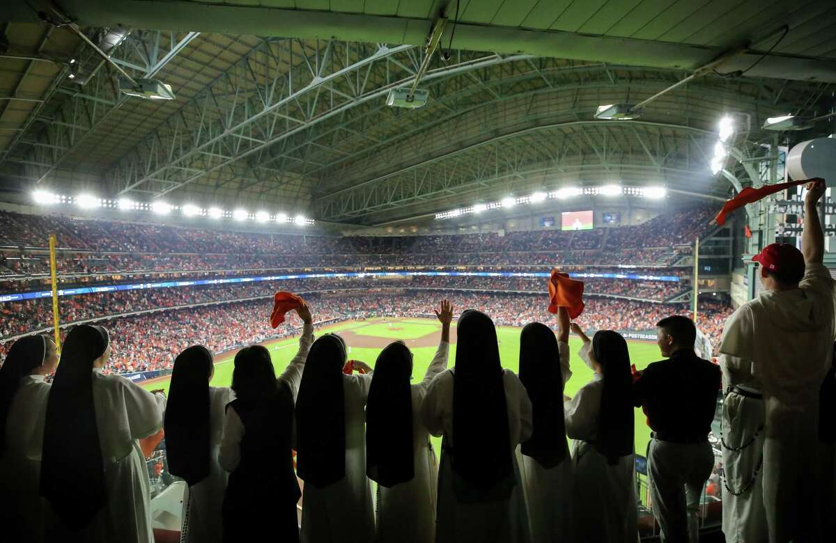 Dominican Sisters of Mary Immaculate Province cheered on as sister Catherine threw the first pitch of game 6 of the American League Championship Series between the Boston Red Sox and the Houston Astros at Minute Maid Park on Friday, Oct. 22, 2021, in Houston.