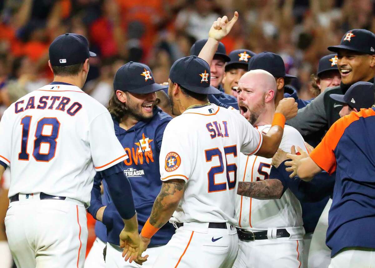 Houston Astros relief pitcher Ryan Pressly (55) celebrates as Boston Red Sox shortstop Xander Bogaerts (2) lines out ending the ninth inning in Game 6 of the American League Championship Series on Friday, Oct. 22, 2021 at Minute Maid Park in Houston.