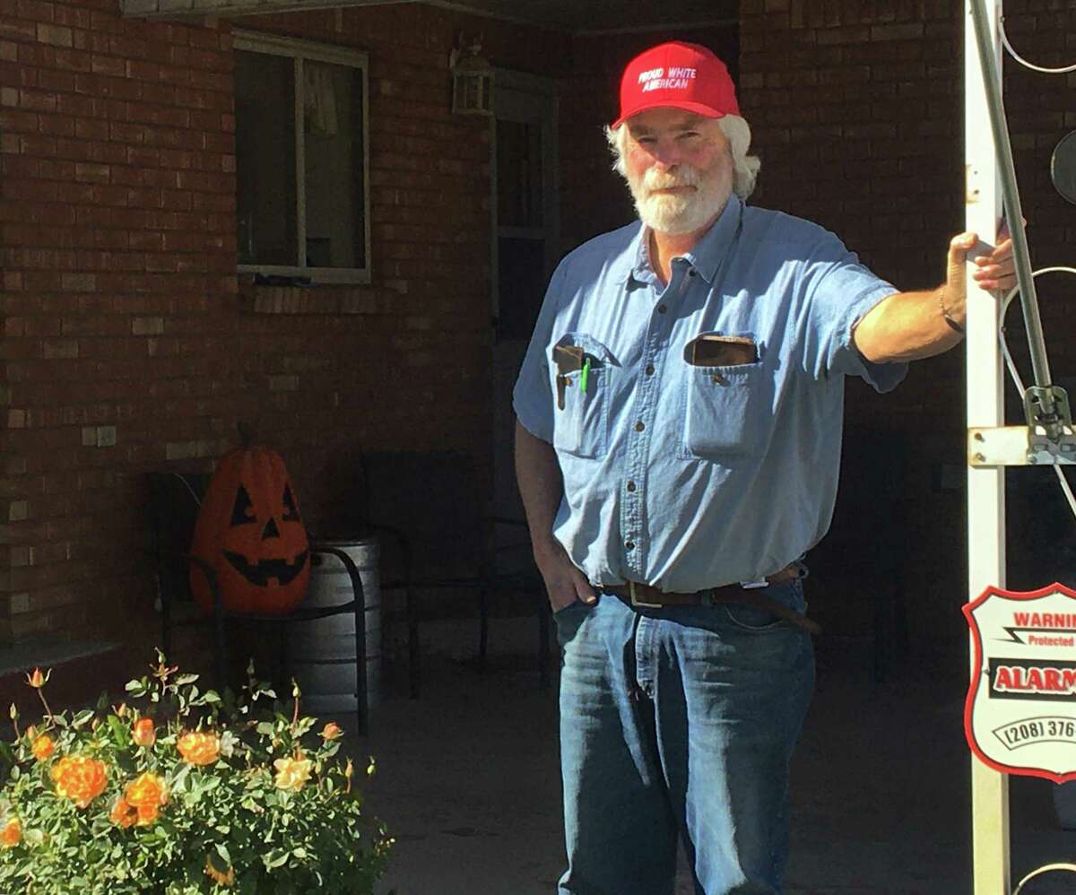 Rod Johnson stands outside his northwest Boise home by an anti-Biden flag that his son helped find for him on the internet. Johnson said he knew he wanted the flag after he saw a similar one flying from the back of a truck.